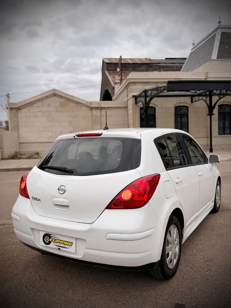 Nissan TIIDA — foto 6