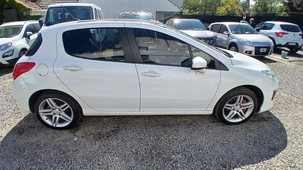 Peugeot 308 5P 2,0 Feline — foto 6