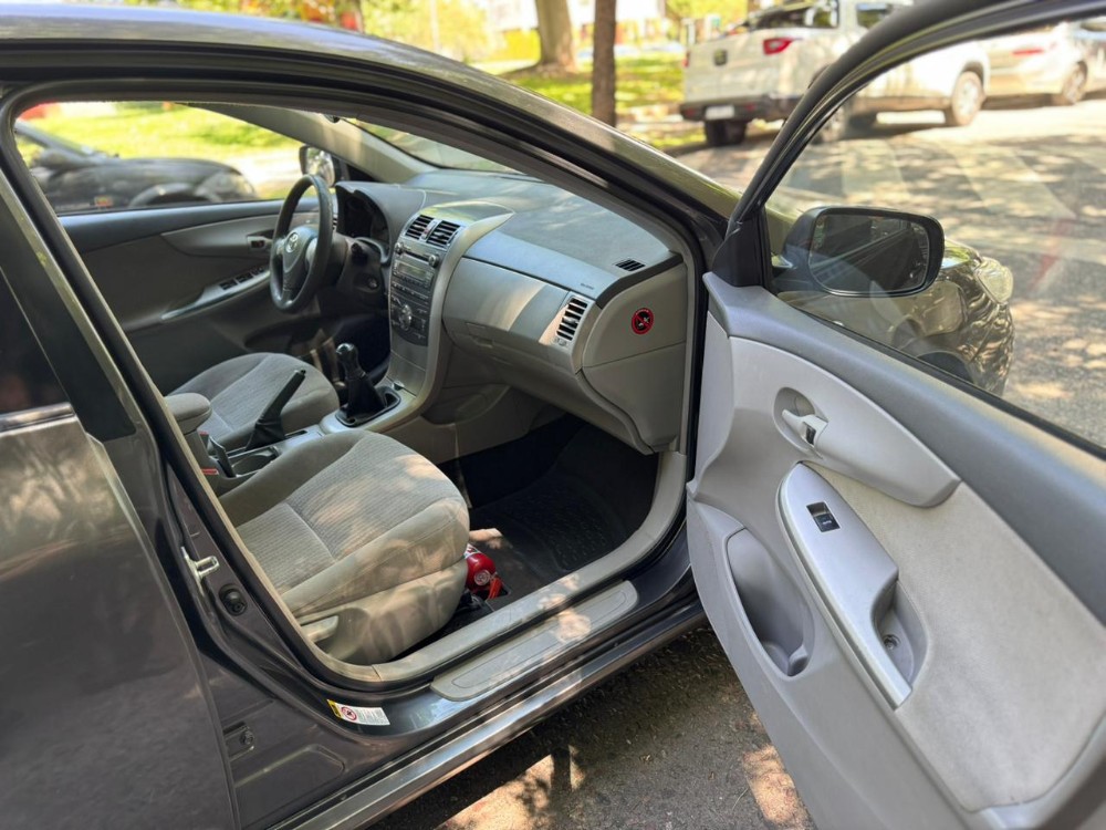 Toyota Corolla Xei — foto 9