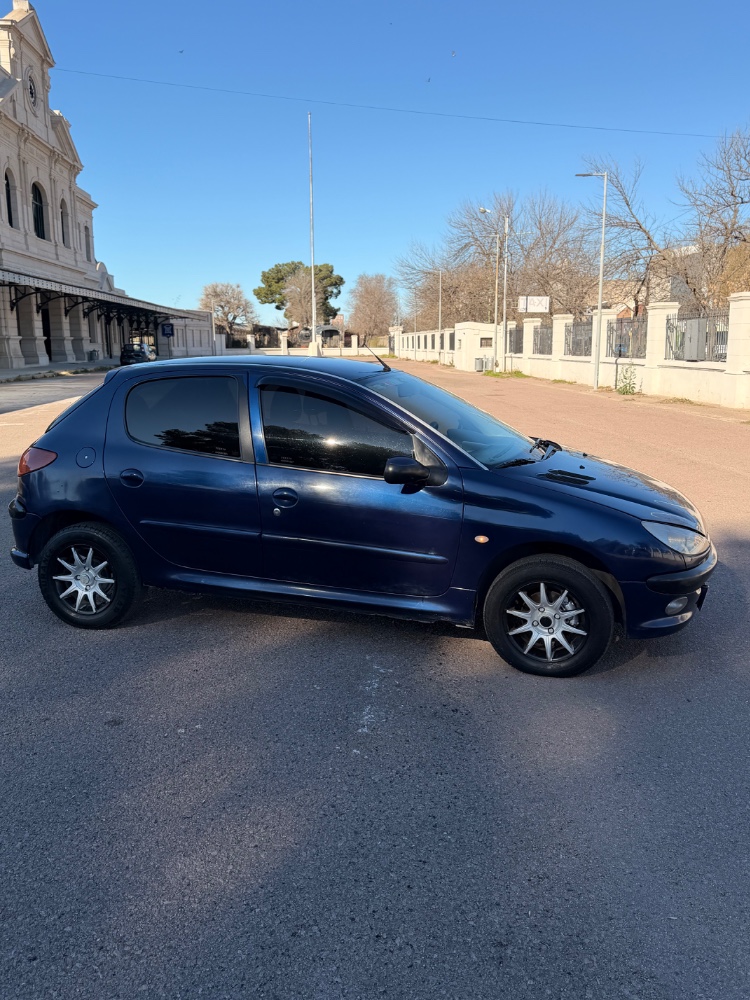 Peugeot 206 — foto 11