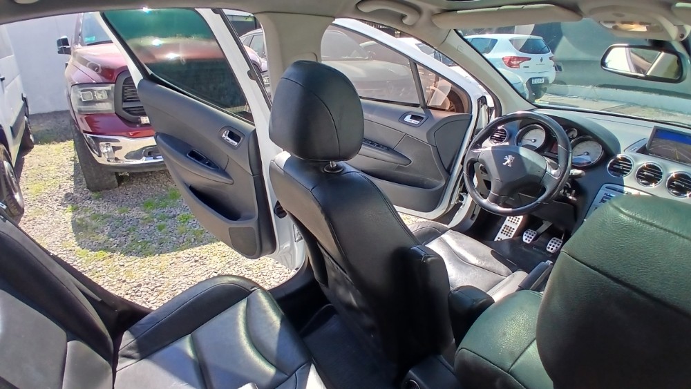Peugeot 308 5P 2,0 Feline — foto 10